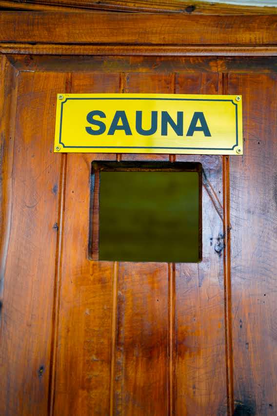 Sauna interior — pine wood walls and benches